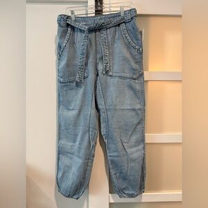 New with tag! We the free denim pull on jogger. Size medium.